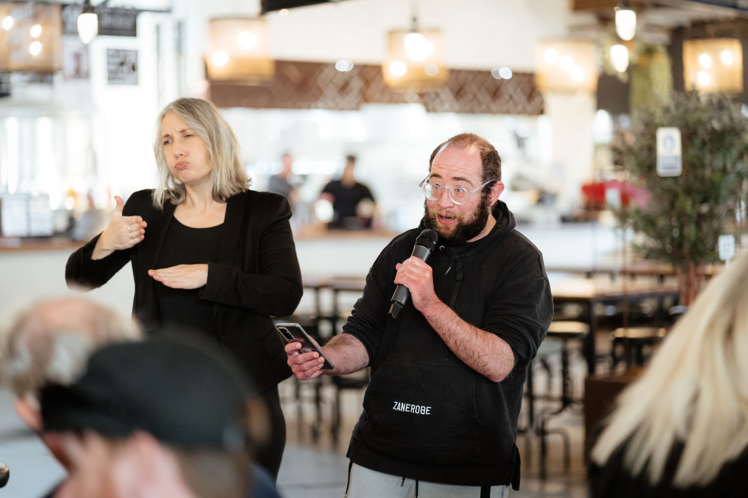 Image description: Bryson Douglas addressing a crowd