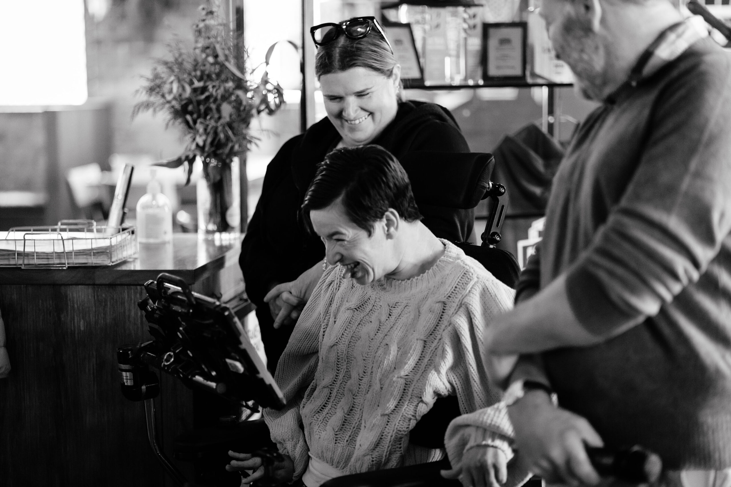 Image description: CDAH peers laughing indoors